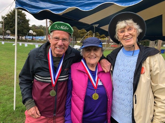 Fred Howell’s age of 82 earned him the title of the Oldest Participant in the recent Run To Read 5K, a fundraiser benefiting the Hawley Public Library. Howell, left, is with his wife Kathy, center, who also ran in the 70+ Runners with a time of 50:43. Fred’s time was 44:12. Susie George, event chair, right, is also president of the Library’s Board of Directors. The Howells are regular participants in this 5K.